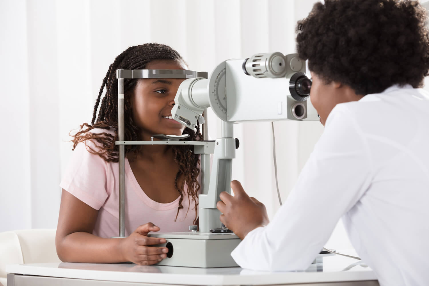 Woman getting a comprehensive eye exam