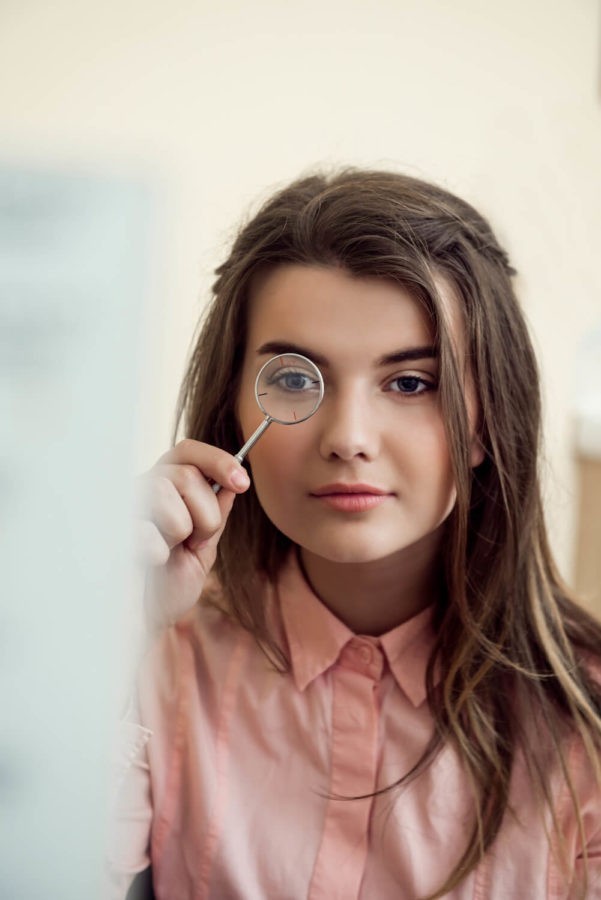 Young woman getting an eye exam at Eyemart in Iowa